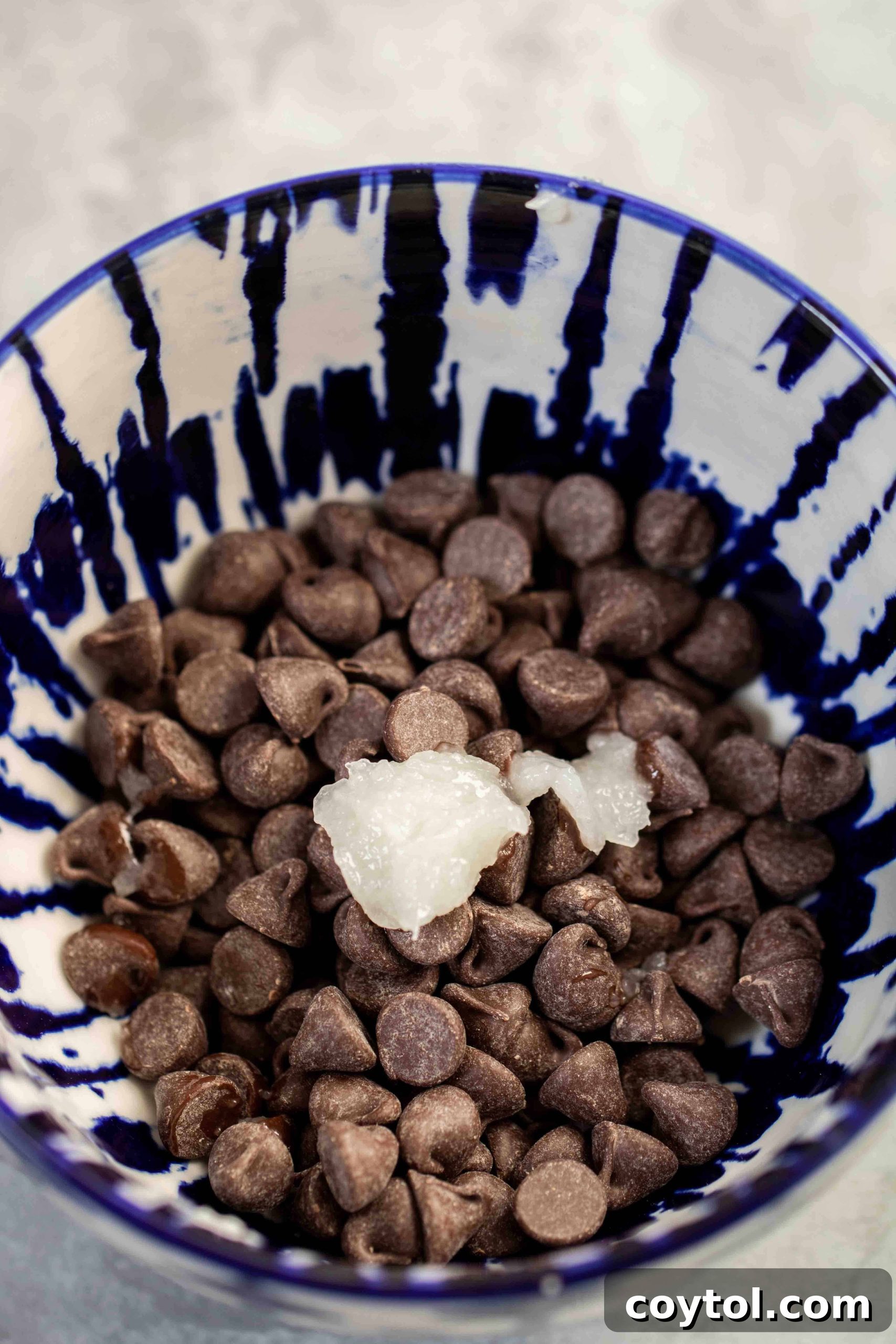 Chocolate chips and coconut oil, ready to be melted