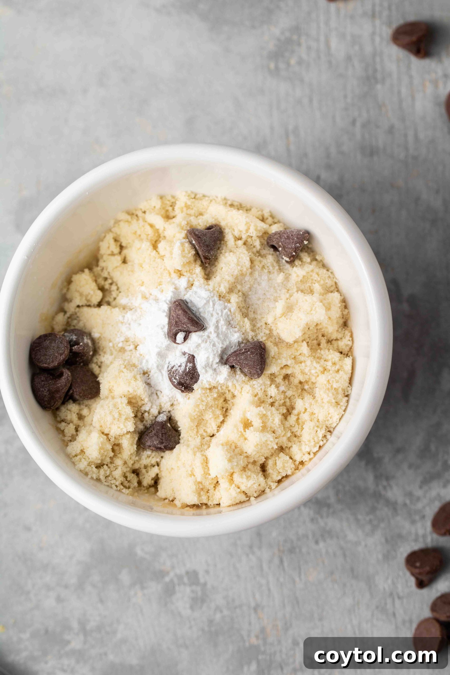 Guilt-Free Vegan Chocolate Chip Mug Treat 7 Folding in chocolate chips for healthy vegan mug cookie