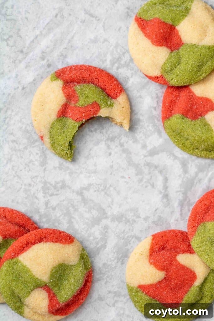 Vibrant Swirled Christmas Sugar Cookie Recipe 3 overhead shot of Christmas sugar cookies with one bit