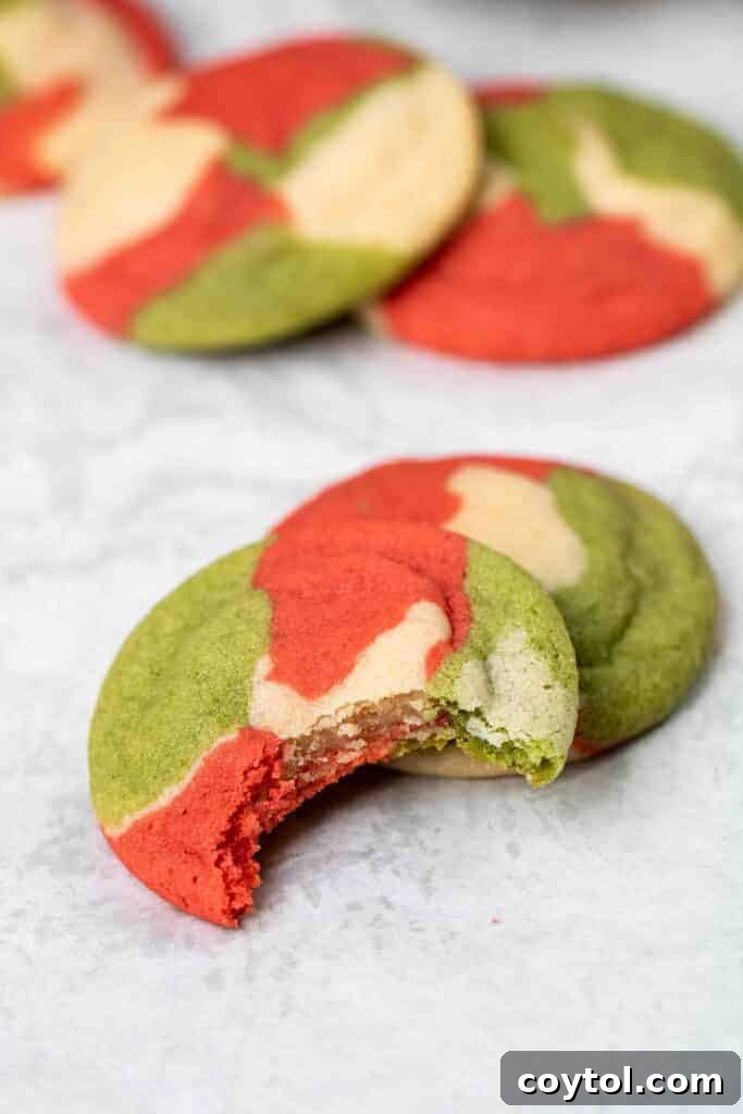 Vibrant Swirled Christmas Sugar Cookie Recipe 5 Christmas sugar cookie with a bite taken out of it