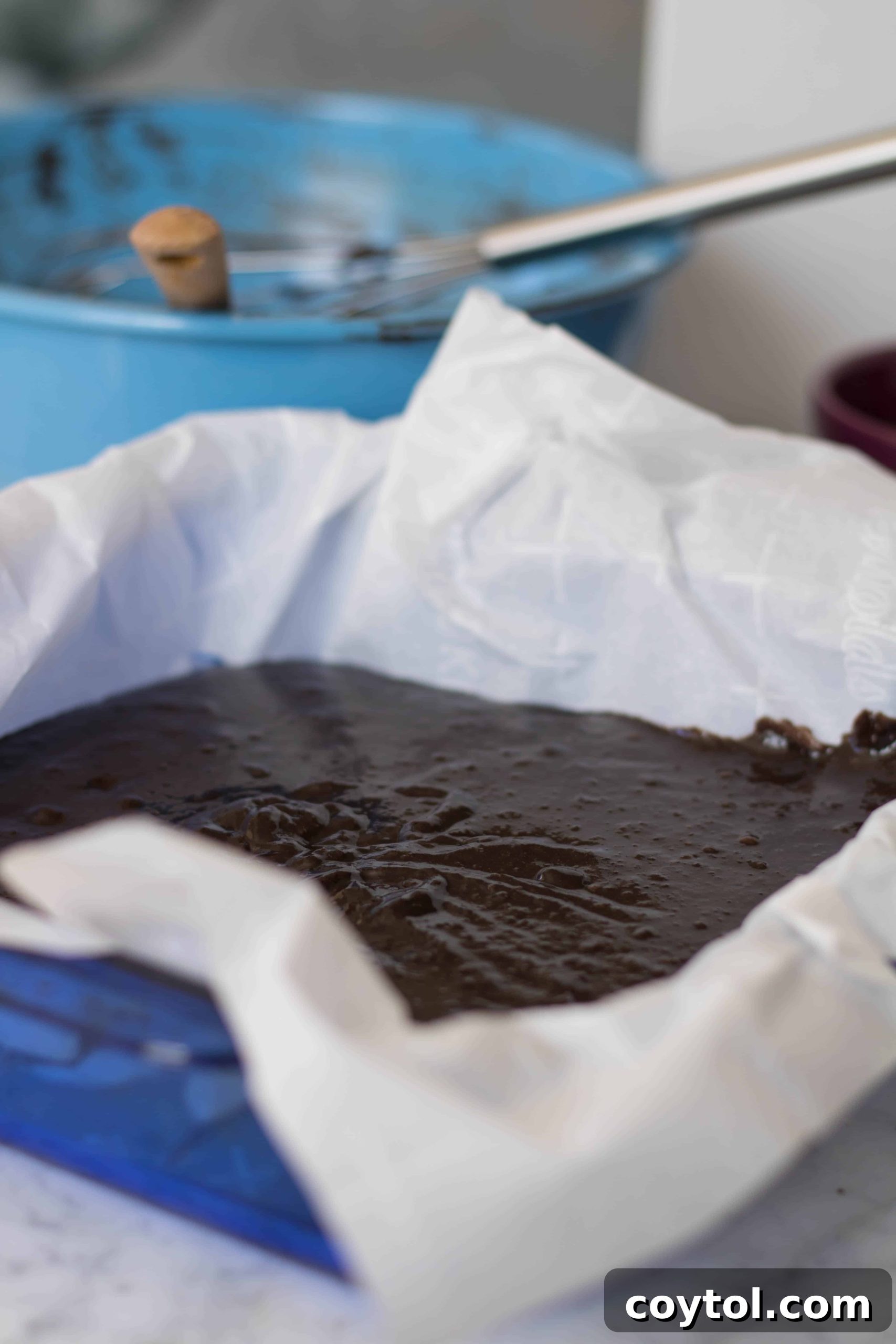 Velvet Sweet Potato Fudge Brownies 8 Sweet potato brownie batter poured into a baking pan