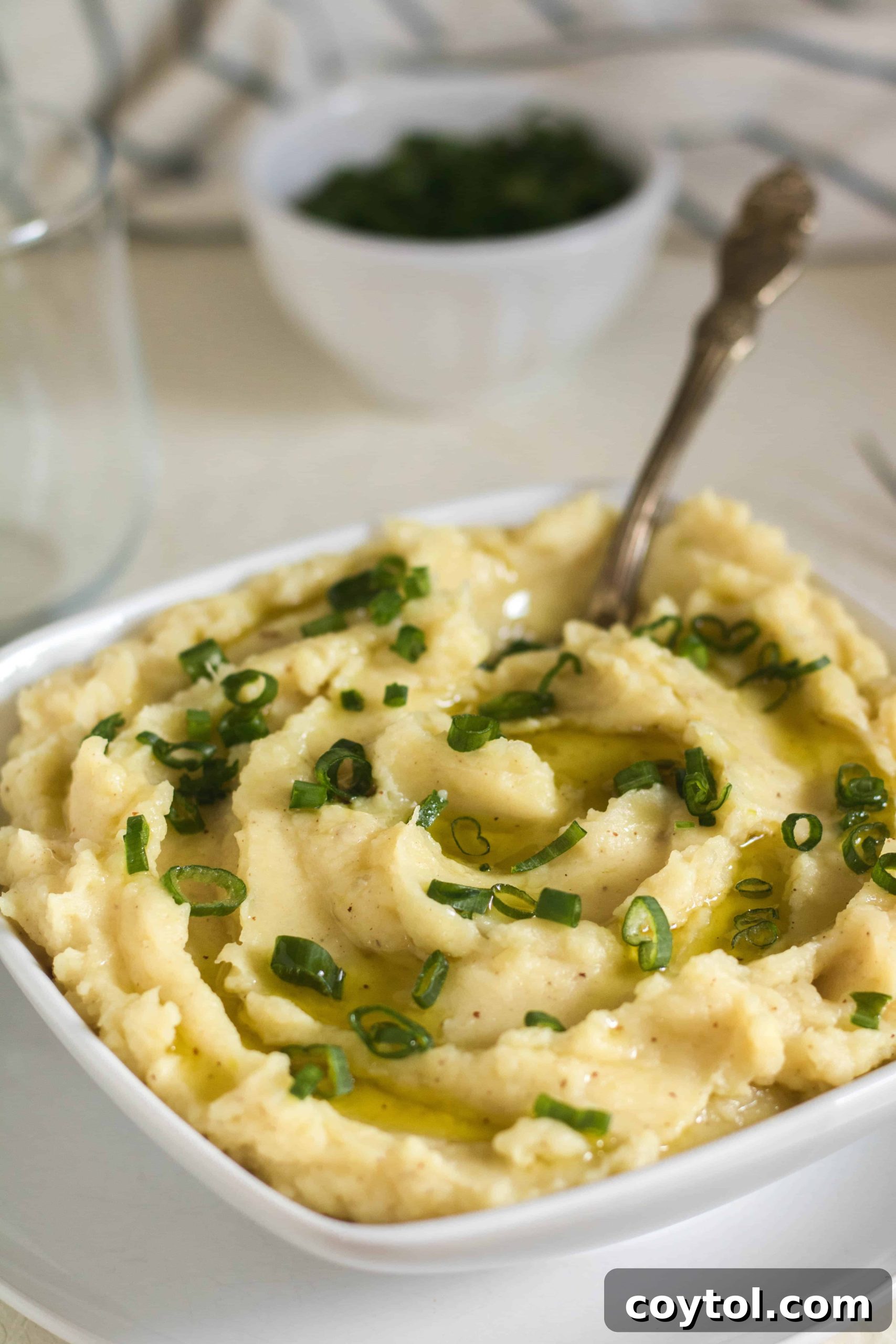 Creamy brown butter mashed sweet potatoes topped with fresh parsley