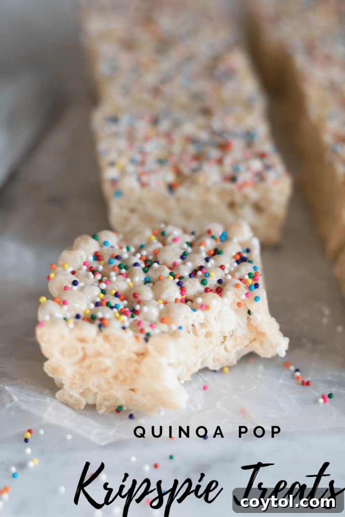 Pin image for Quinoa Pop Krispie Treats, a stack with a bite taken out.