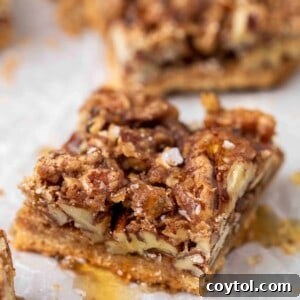 Close-up of a square healthy pecan pie bar.