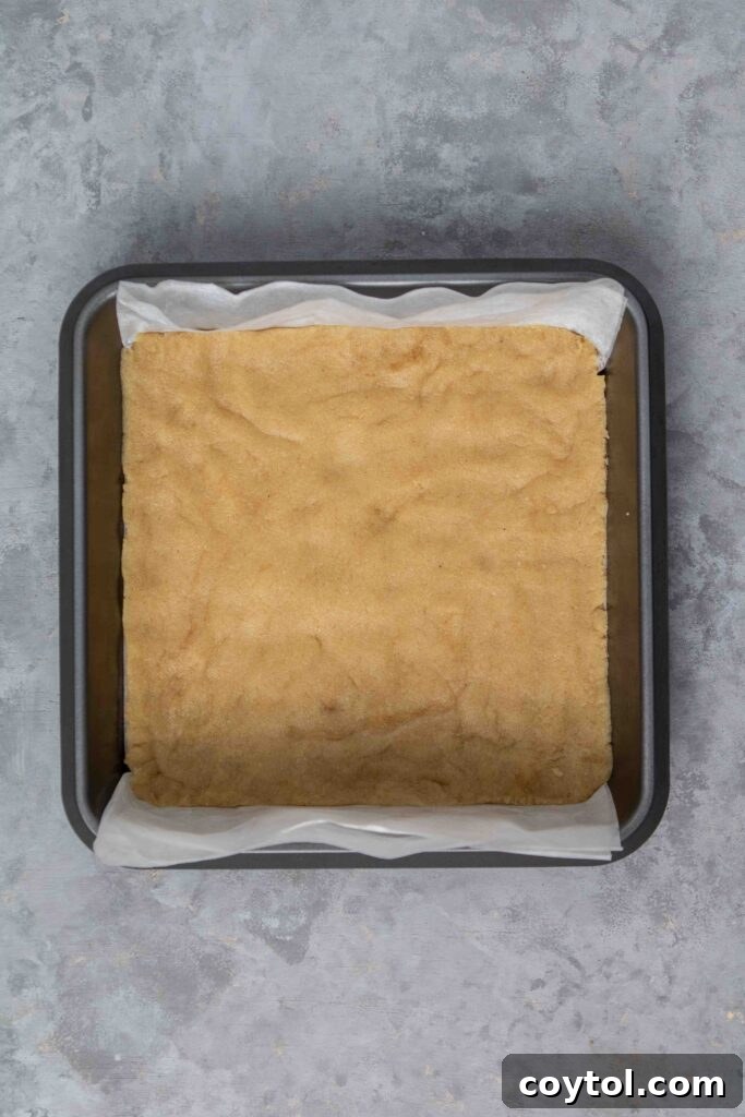 Baked gluten-free shortbread crust, lightly golden.