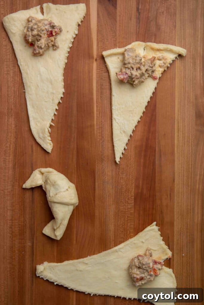 Zesty Rotel Beef and Cheese Crescents 5 Step 2: Add ground beef and Rotel dip filling to crescent dough