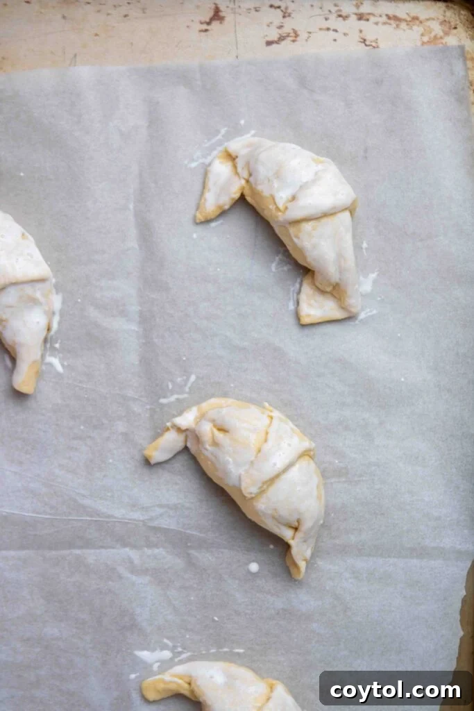 Zesty Rotel Beef and Cheese Crescents 6 Step 3: Roll up stuffed crescent dough triangles