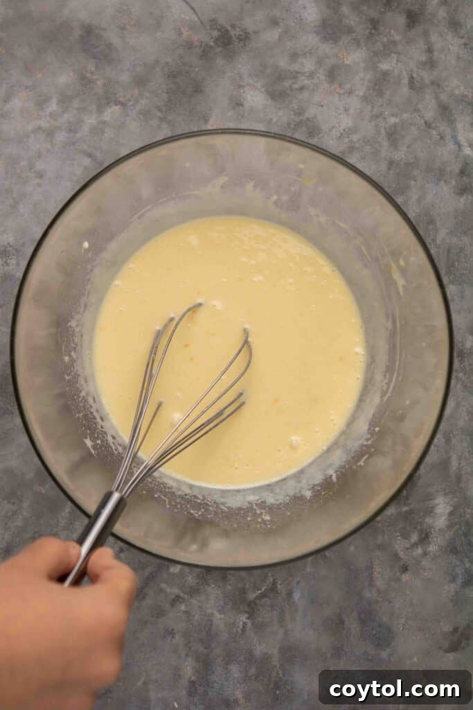 Step-by-step: Folding cranberries into muffin batter