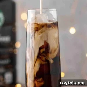 Pouring-sweet-cream-over-cold-brew