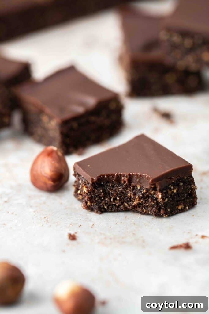 Close-up of a vegan chocolate hazelnut bite on a plate