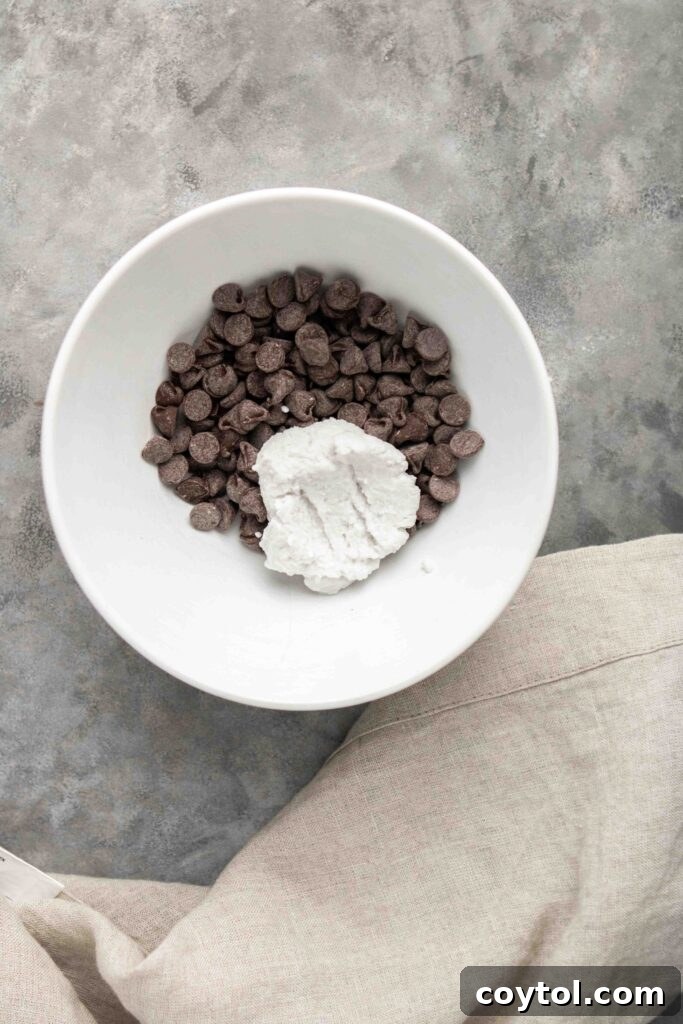 Step-by-step image of melting dairy-free chocolate chips for ganache