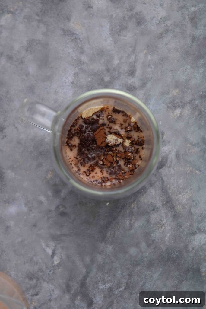 Guilt-Free 3-Ingredient Hazelnut Hot Chocolate 5 Mixing cocoa powder and maple sugar for hot chocolate