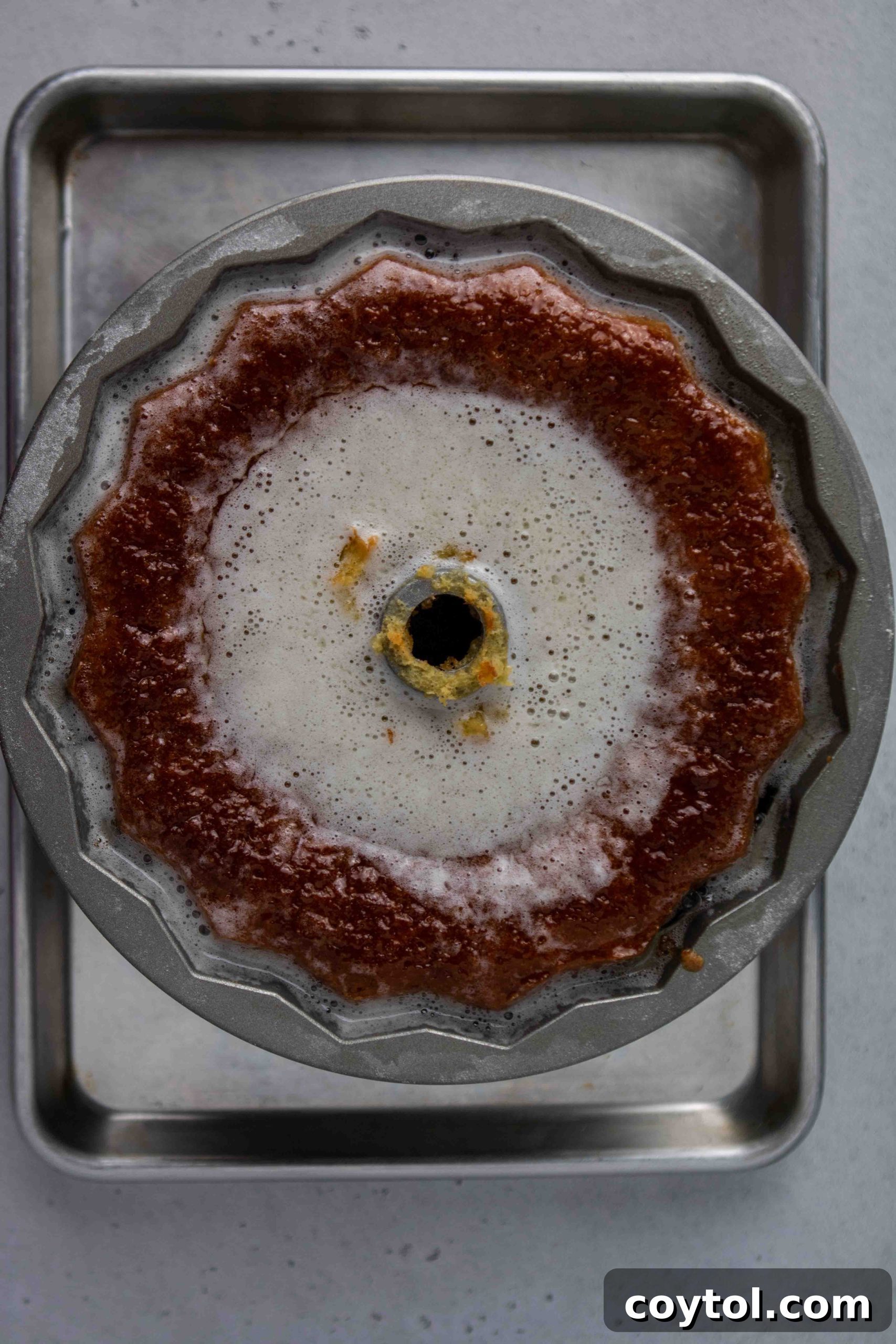 The Ultimate Not-Too-Sweet Bundt Cake 12 How to make wine butter syrup: pouring over hot cake