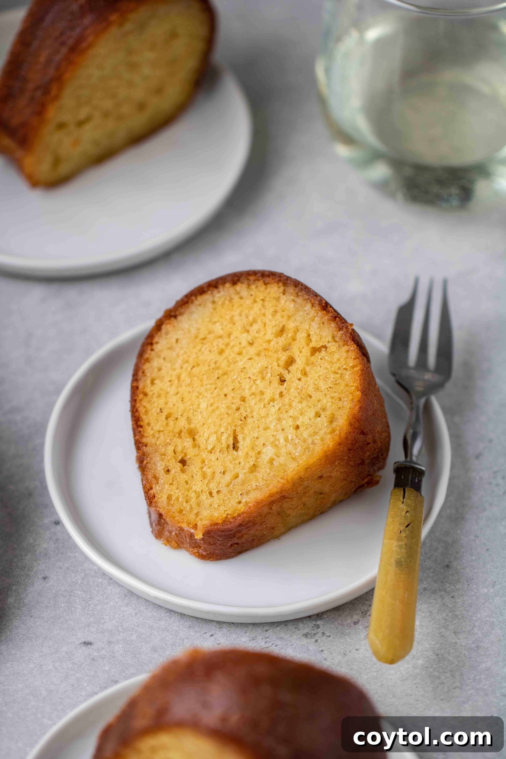 The Ultimate Not-Too-Sweet Bundt Cake 4 Slice of butter cake bundt cake with wine glaze