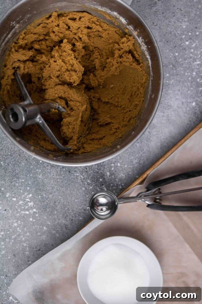 Step-by-step image of baked cookies on a baking sheet