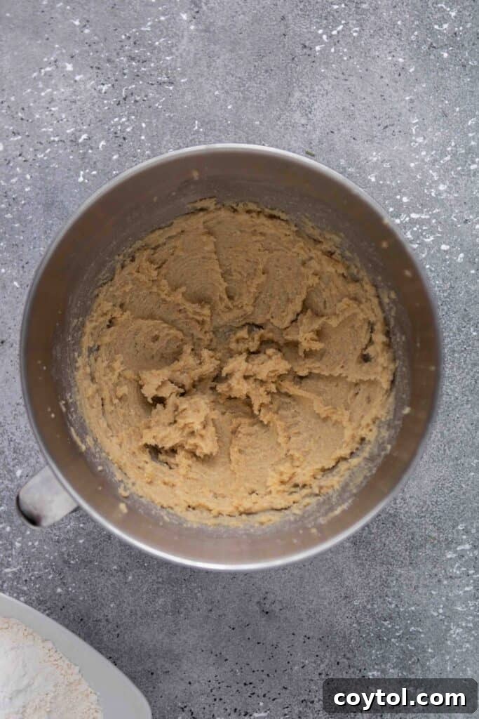 Step-by-step image of adding egg and molasses