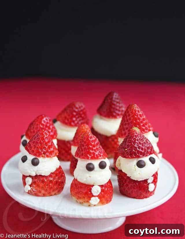Strawberry whipped cream Santas, a delicious fruit-based no-bake treat.