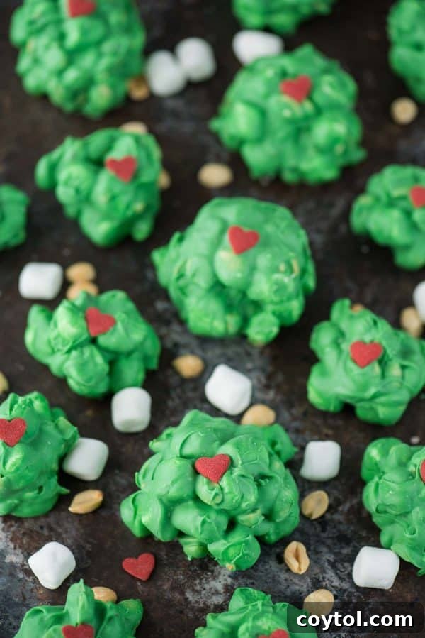 Grinch peanut cluster to make with kids, a sweet and salty no-bake treat.