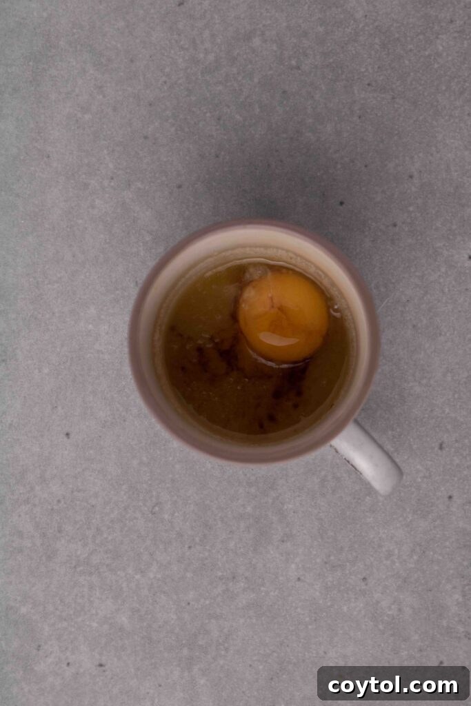 How to make a sugar cookie in a mug: mixing wet ingredients