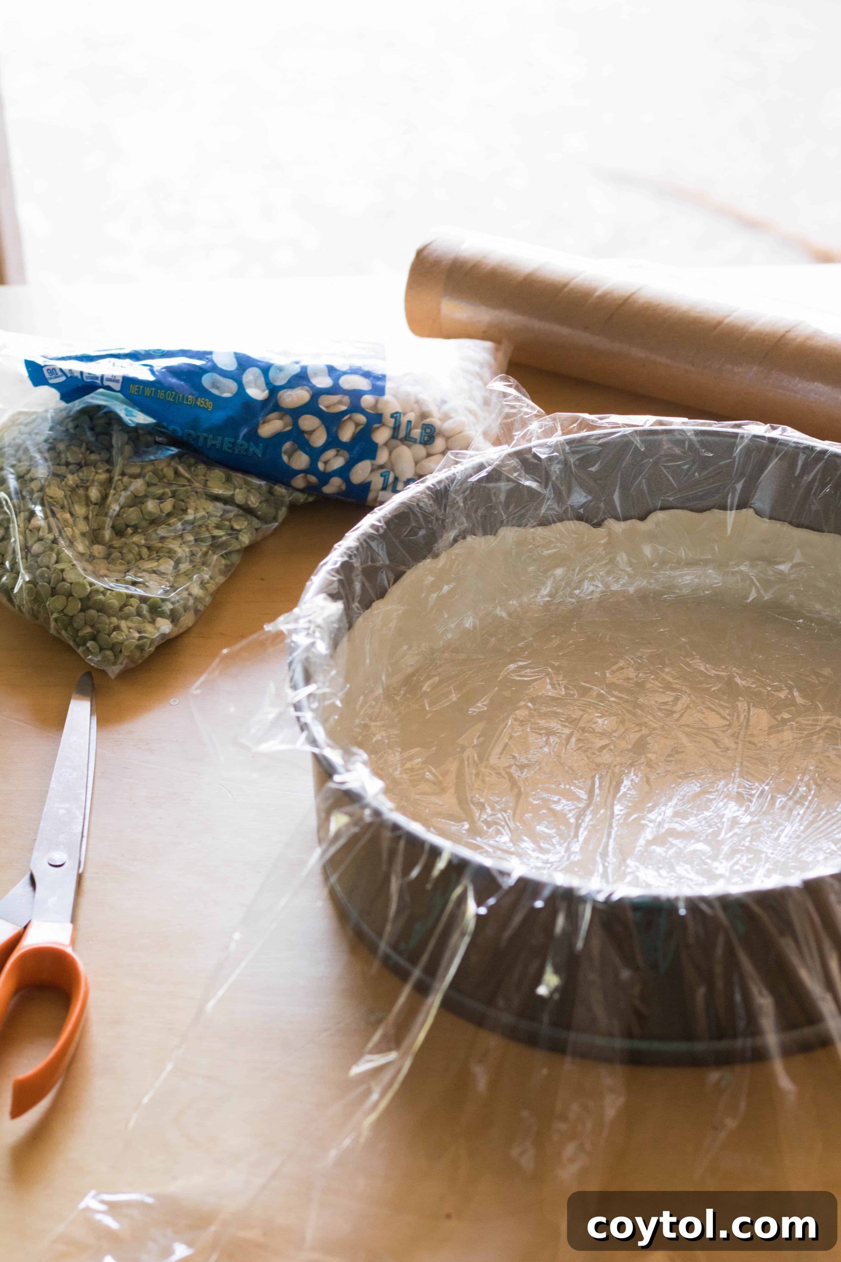 Mastering Flawless Pie and Tart Shells: 4 Secrets Revealed 6 lining the pie crust before baking