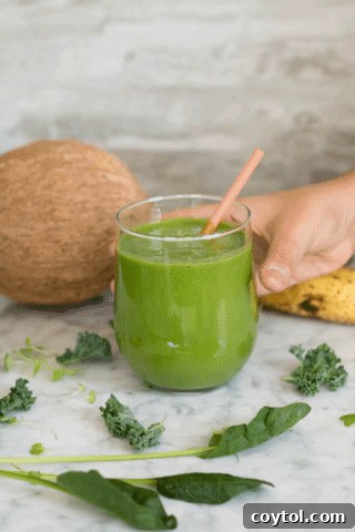 Green Smoothie with Spinach and Kale in a glass