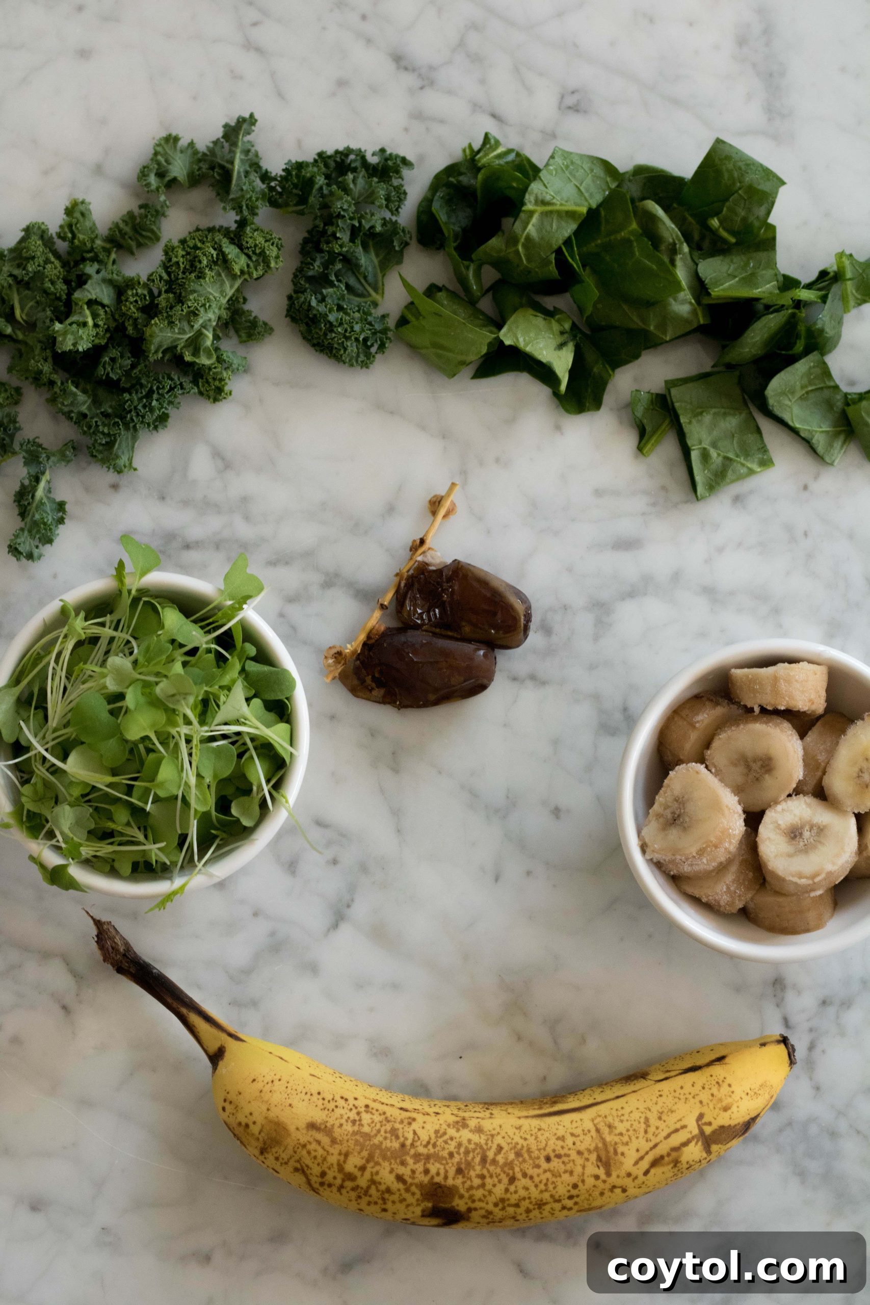 Ingredients for the Kale and Spinach Smoothie recipe laid out