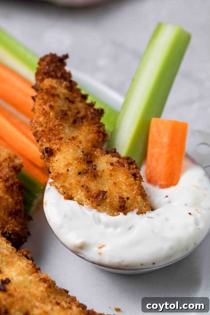 Chicken tender dipped in ranch