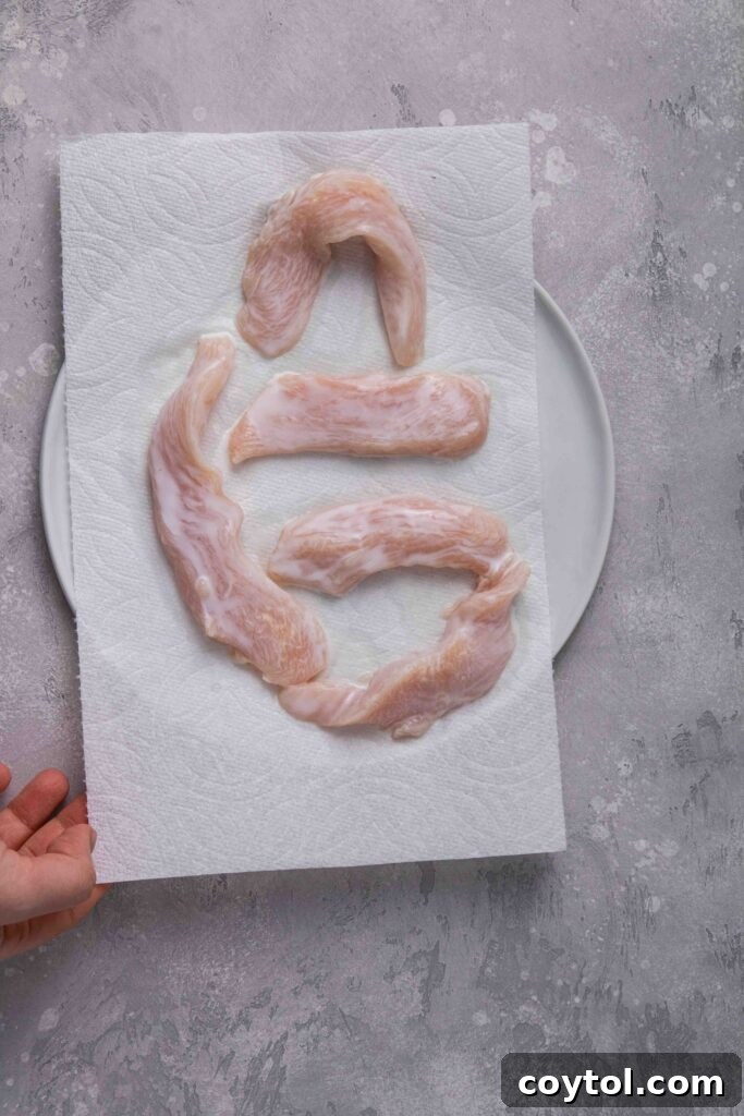 Dry the chicken tenders from the buttermilk