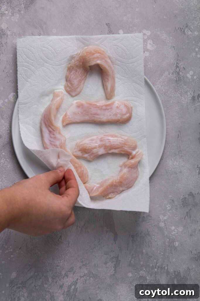 Dry the chicken tenders from the buttermilk