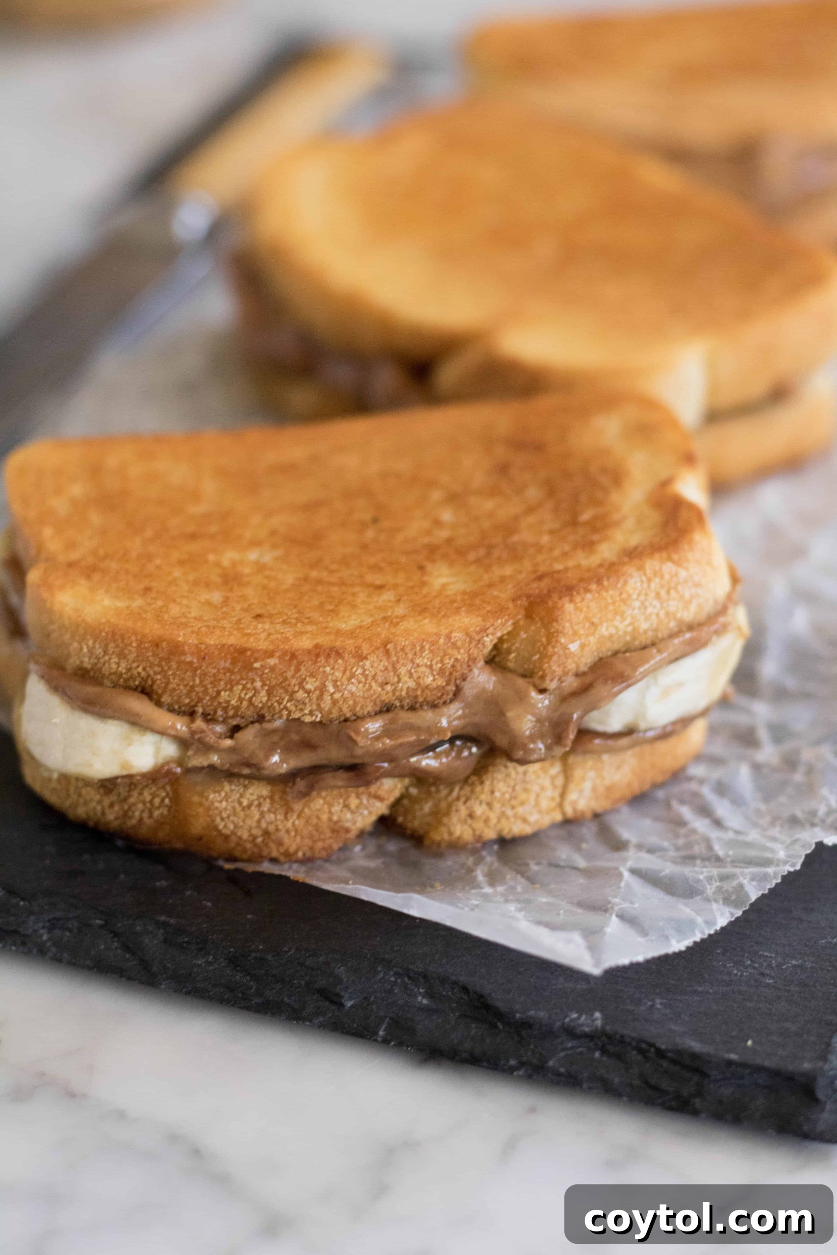 Mouthwatering Grilled Peanut Butter Banana Sandwich, perfectly golden brown