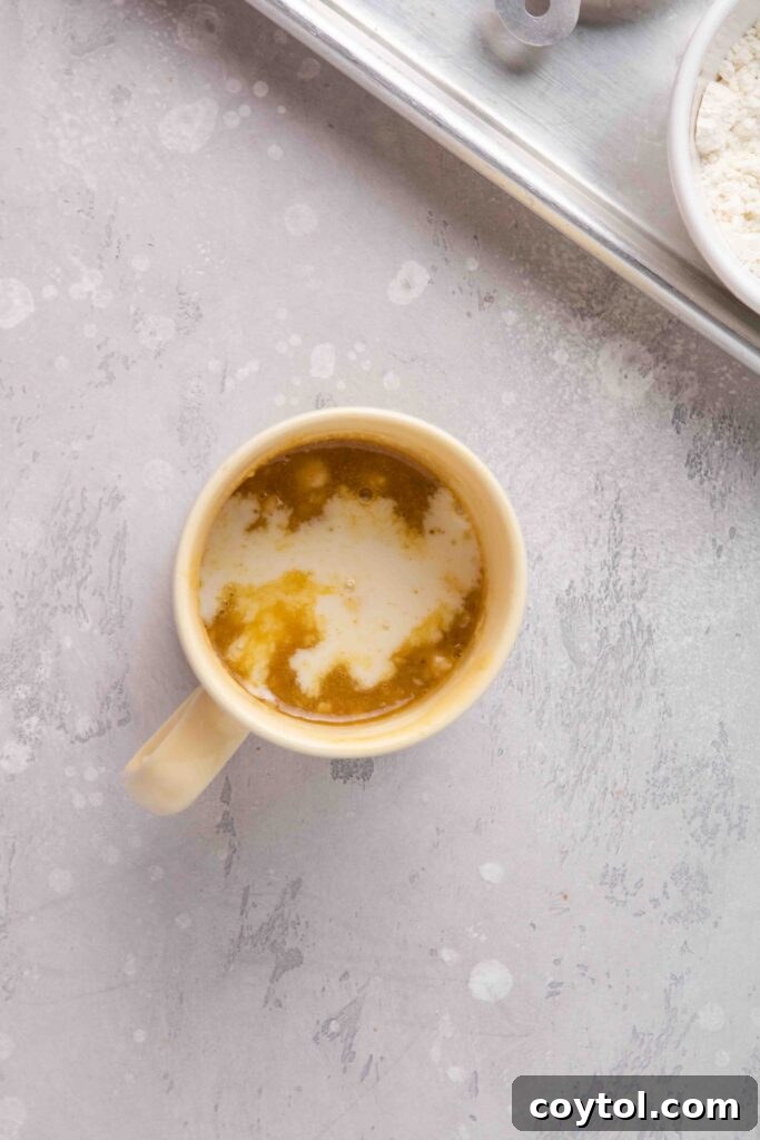 The Ultimate Single-Serve Banana Bread Mug Cake 8 Add the milk to the mug cake ingredients