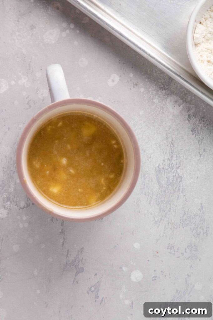 The Ultimate Single-Serve Banana Bread Mug Cake 9 Add the mashed banana to the banana mug cake