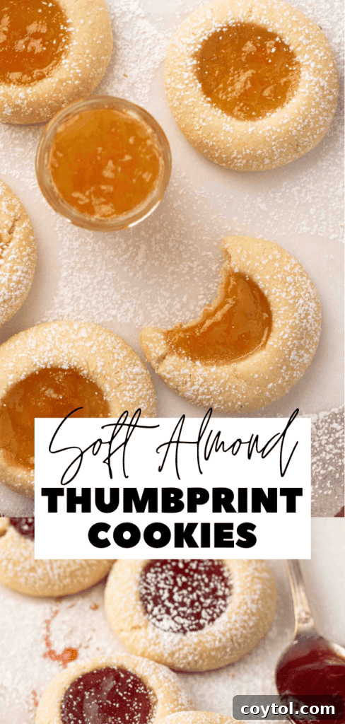 Pin image: Tray of freshly baked almond thumbprint cookies with golden edges.