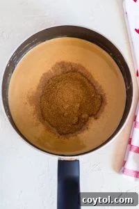 18 Easy No-Bake Valentine Treats for Kids 23 adding coconut sugar to the melted ingredients