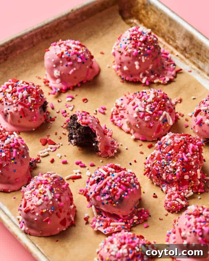 18 Easy No-Bake Valentine Treats for Kids 7 Charming pink no-bake Valentine's Day Oreo truffles, a sweet treat for kids.