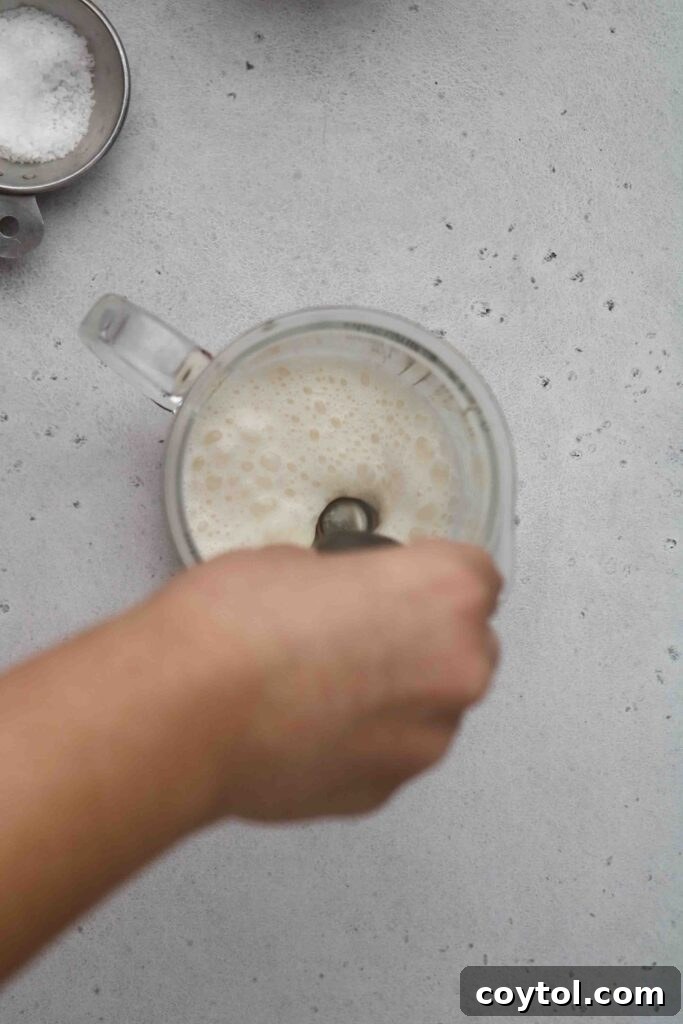 Mix the mixture using a hand held frother