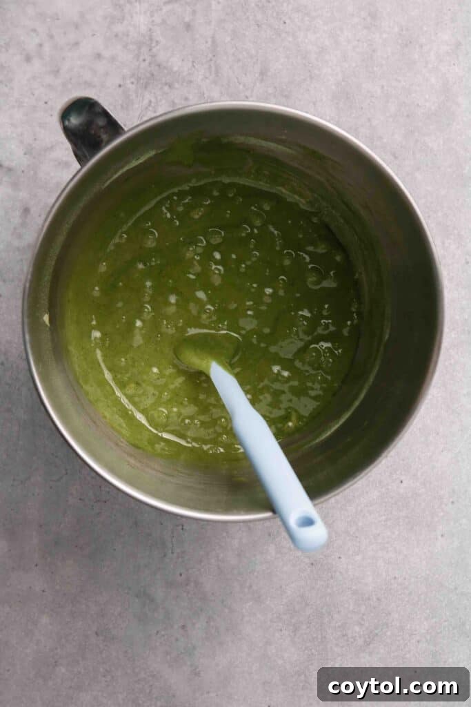 Fold the flour mixture in the egg mixture