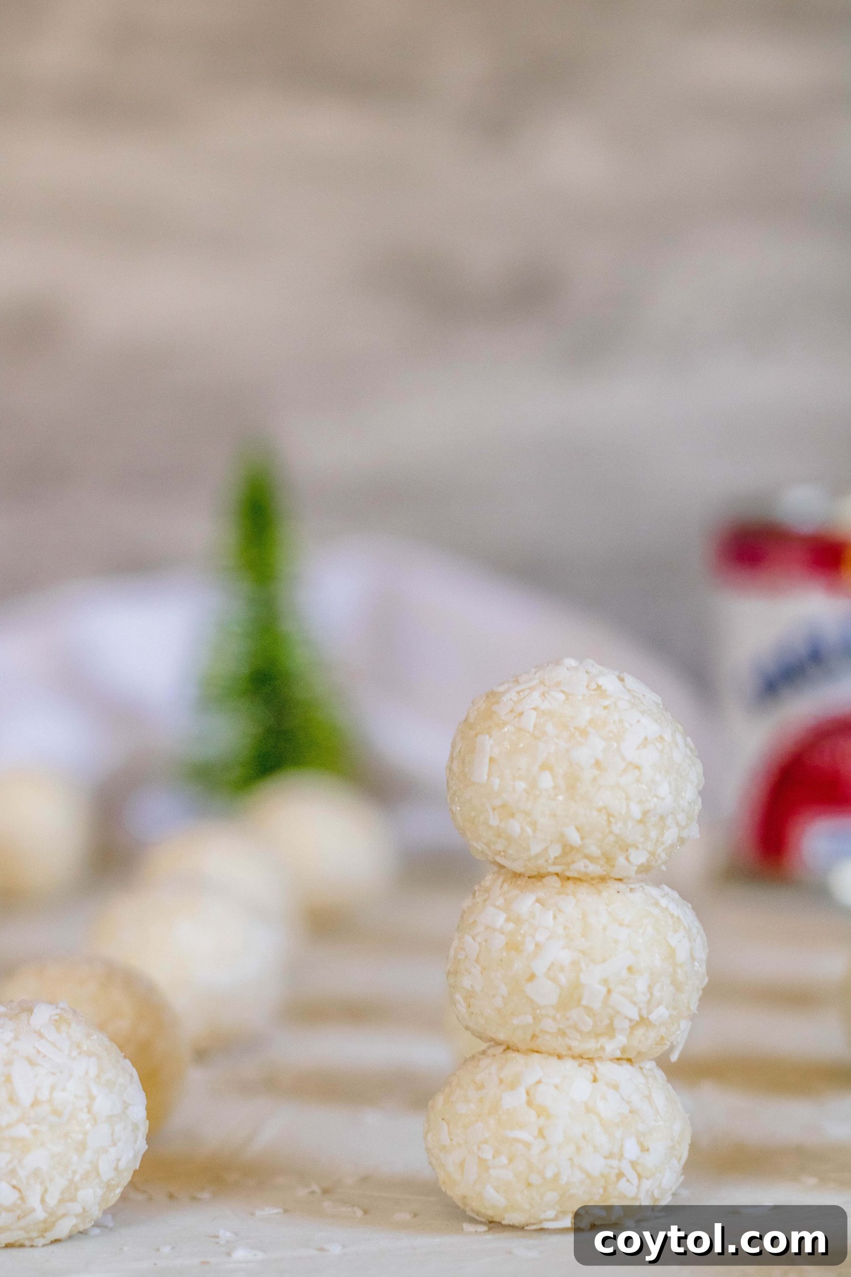 Super easy coconut ball recipe for Christmas, festive and quick to make for the holidays.