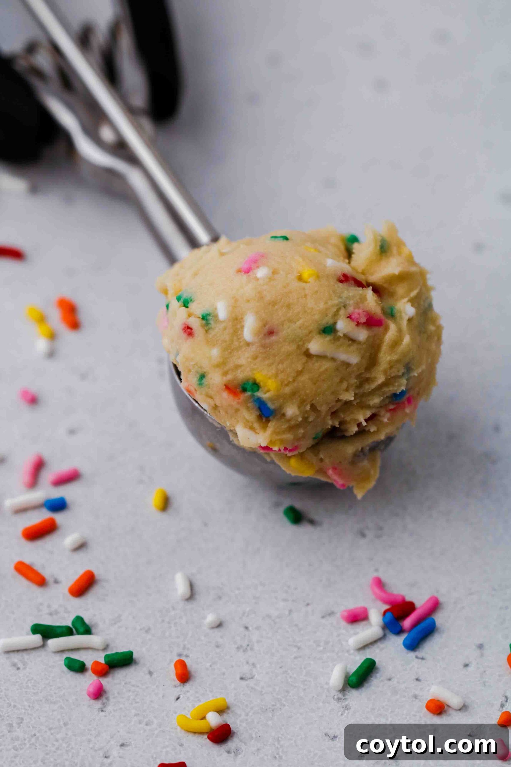 Edible cookie dough scooped into an ice cream scooper