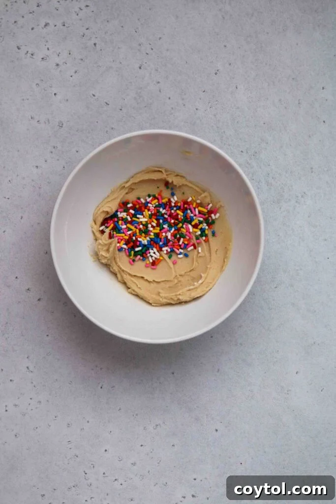 Adding sprinkles to edible cookie dough