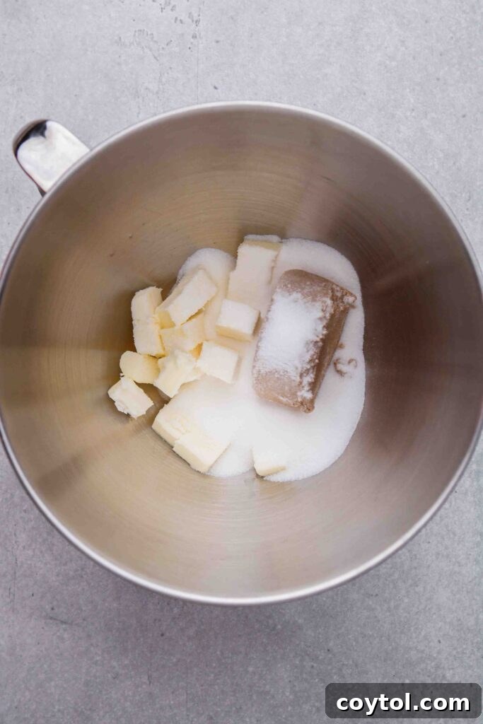Creaming butter with sugar, an essential first step in cookie making.