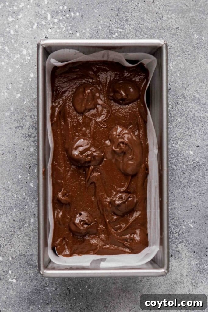 Small Batch Fudgy Nutella Brownie Loaf 13 Add dollops of Nutella on top of the brownie batter
