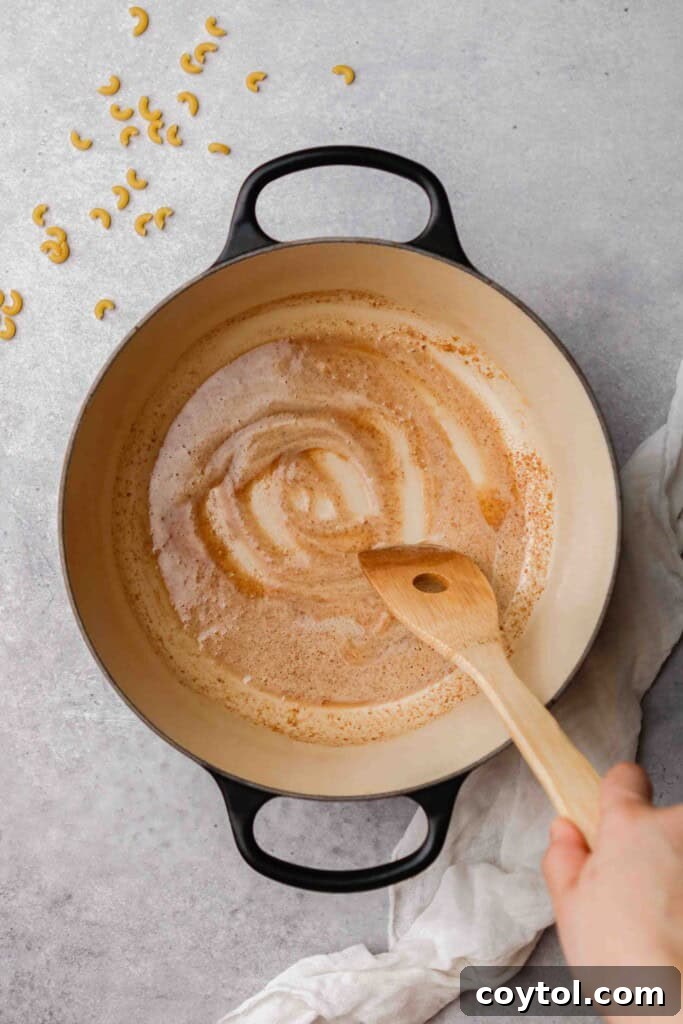 Unforgettable Stovetop Mac and Cheese 6 Cooking butter and flour to create a roux