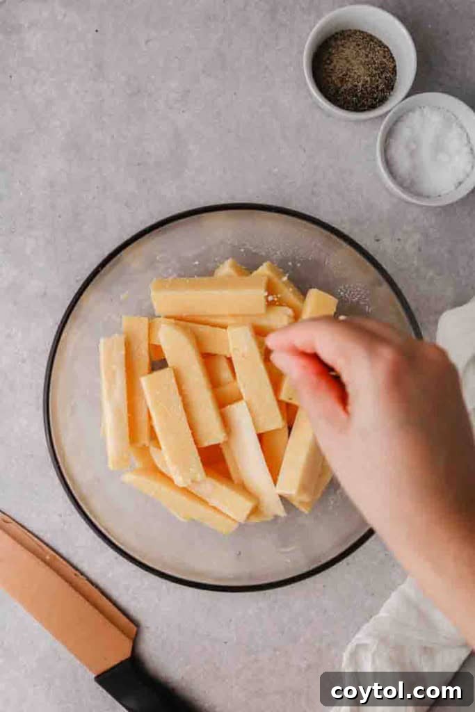 Season the polenta fries
