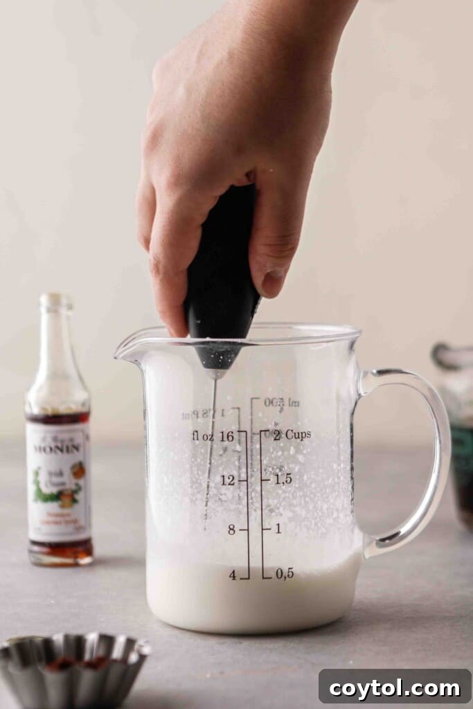 The Ultimate Starbucks Irish Cream Cold Brew 8 Froth vanilla sweet cream with a hand held frother
