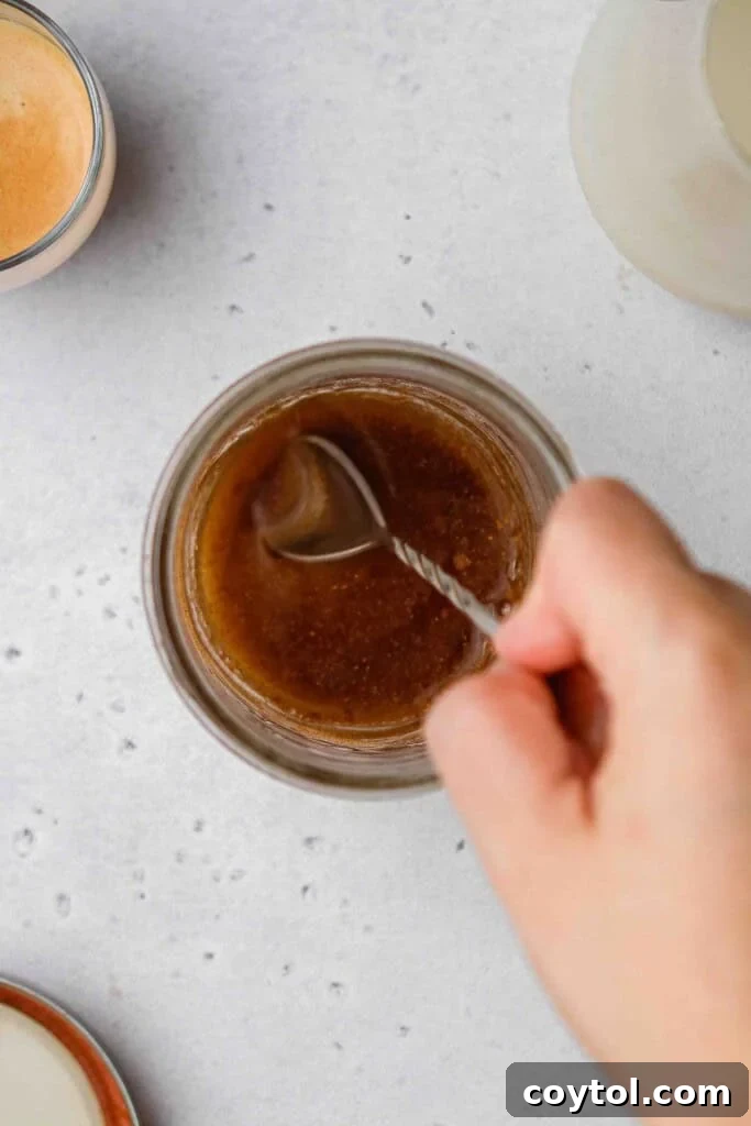 Brown Sugar Oat Espresso Velvet 7 Spoon stirring brown sugar syrup ingredients