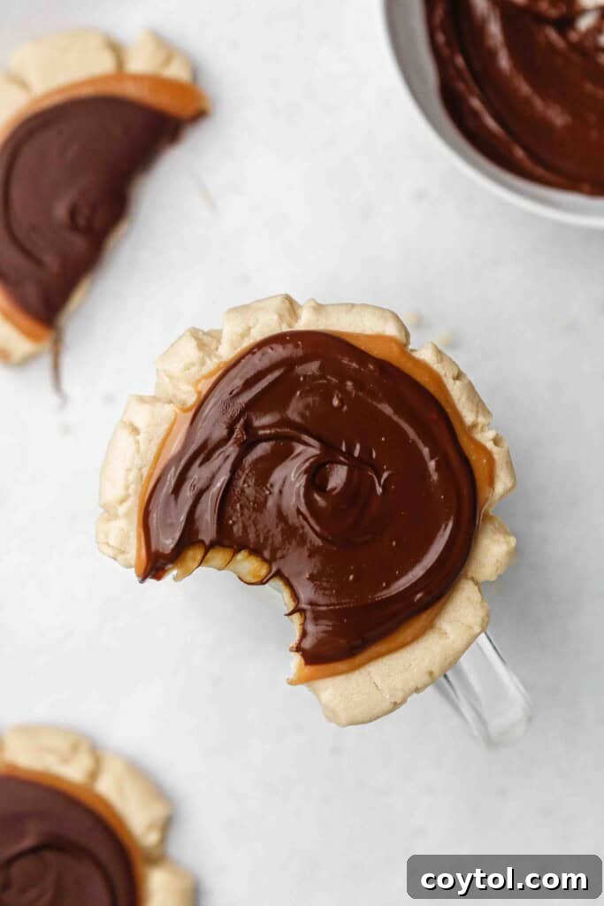 Overhead shot of a Twix cookie with a bite taken out