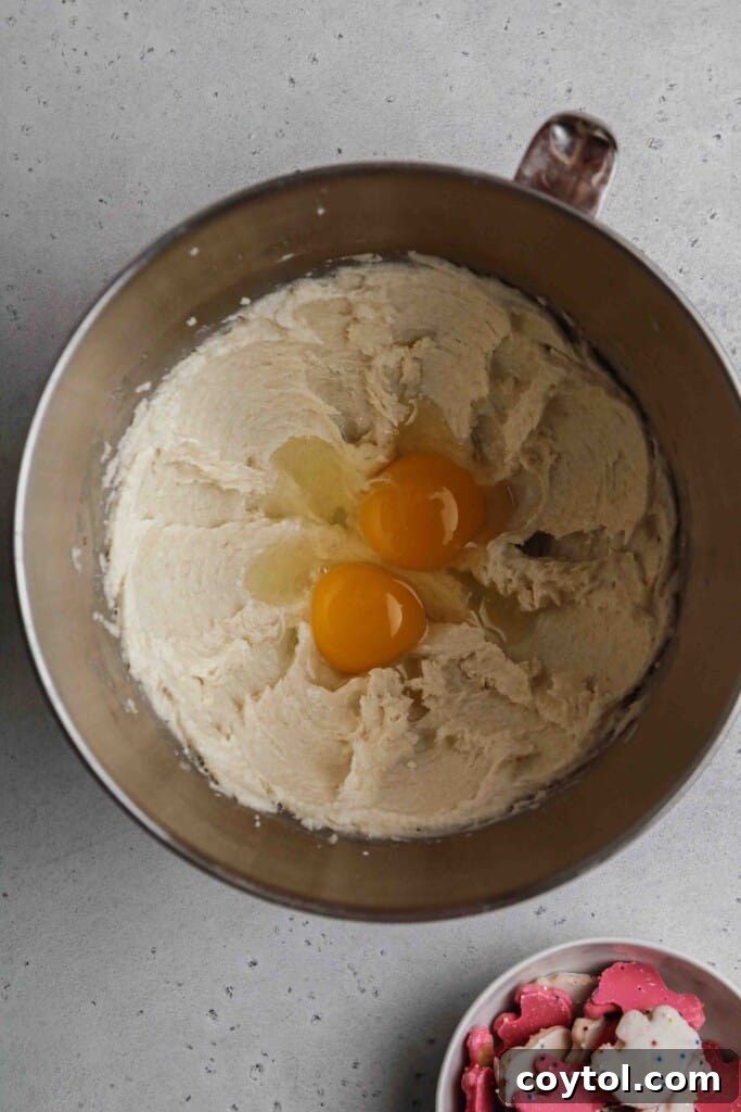 Pillowy Soft Crumbl Circus Animal Cookies 7 Add the egg and extracts to the butter mixture.
