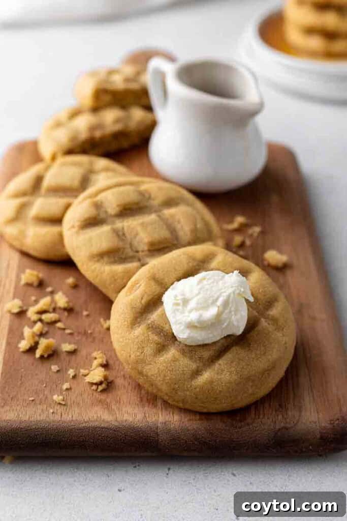 CRUMBL Waffle Cookies Crowned with Buttercream 13 CRUMBL cookies on a cutting board