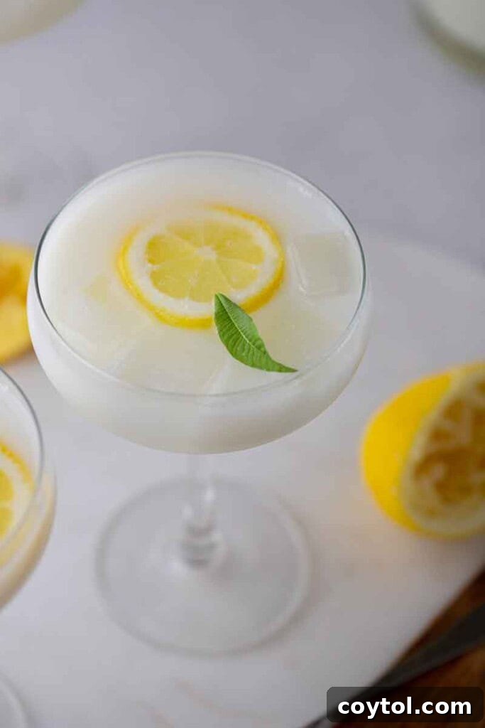 Easy creamy lemonade served in a champagne glass, ideal for summer gatherings